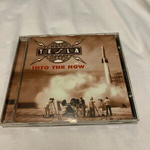 Tesla into the now CD